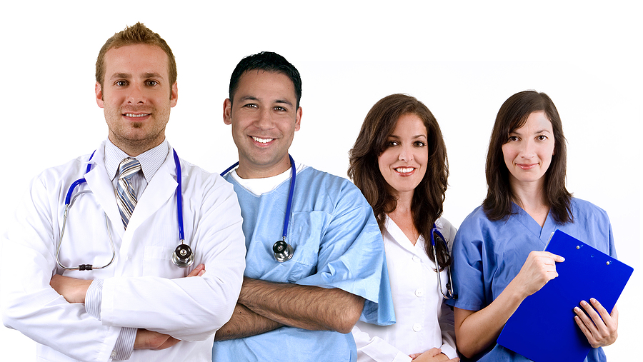 Smiling medical team standing together.