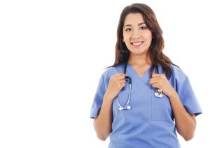 Female medical worker wearing scrubs and holding onto a stethoscope. 